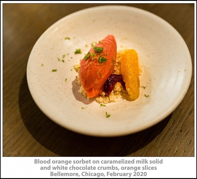 Blood orange sorbet on caramelized milk solid and white chocolate crumbs, orange slices, Bellemore, Chicago, February 2020